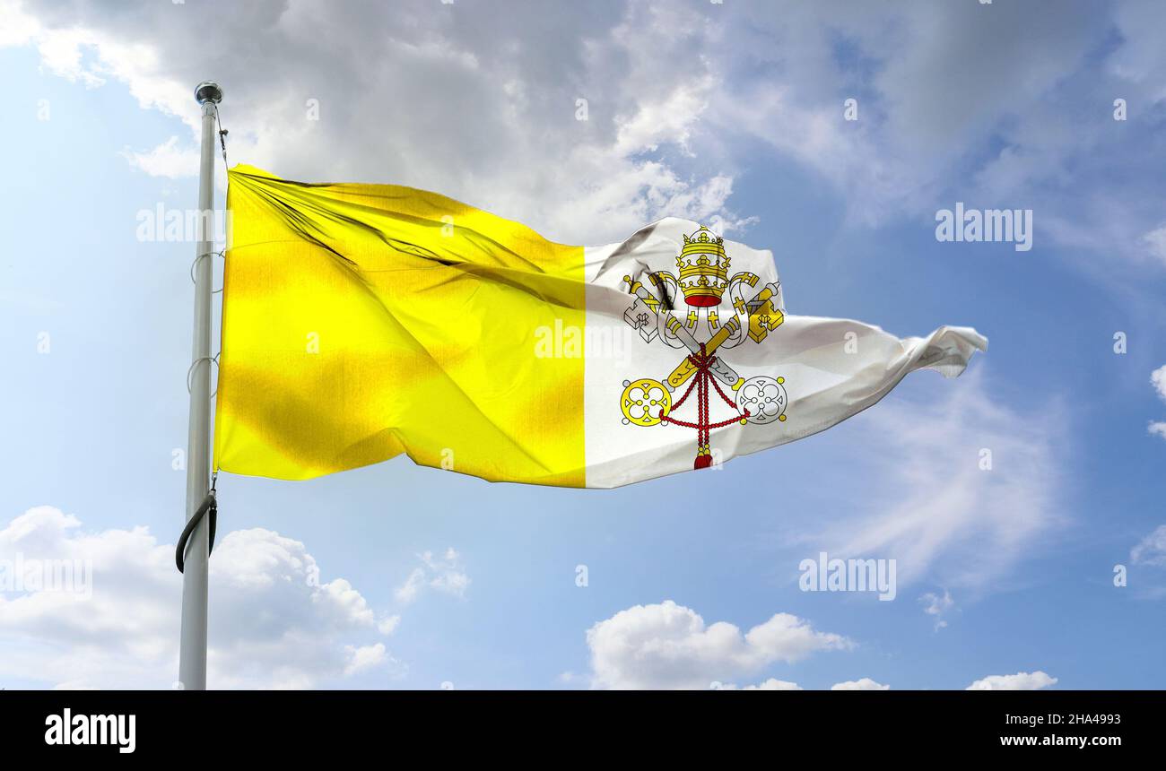 Flagge der Vatikanstadt - realistische Flagge aus winkenden Stoffen. Stockfoto