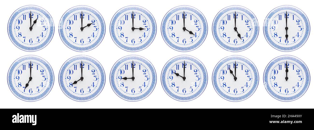 Antike Uhr mit zwölf Zeitzonen isoliert auf weißem Hintergrund Stockfoto