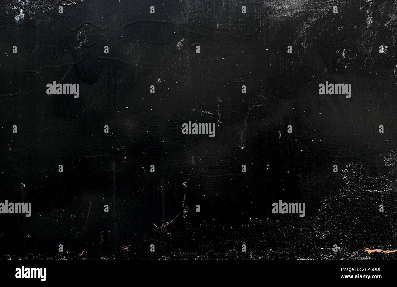 Schwarze kolossierte Gipswand Detail, grunge Hintergrund oder Textur Stockfoto
