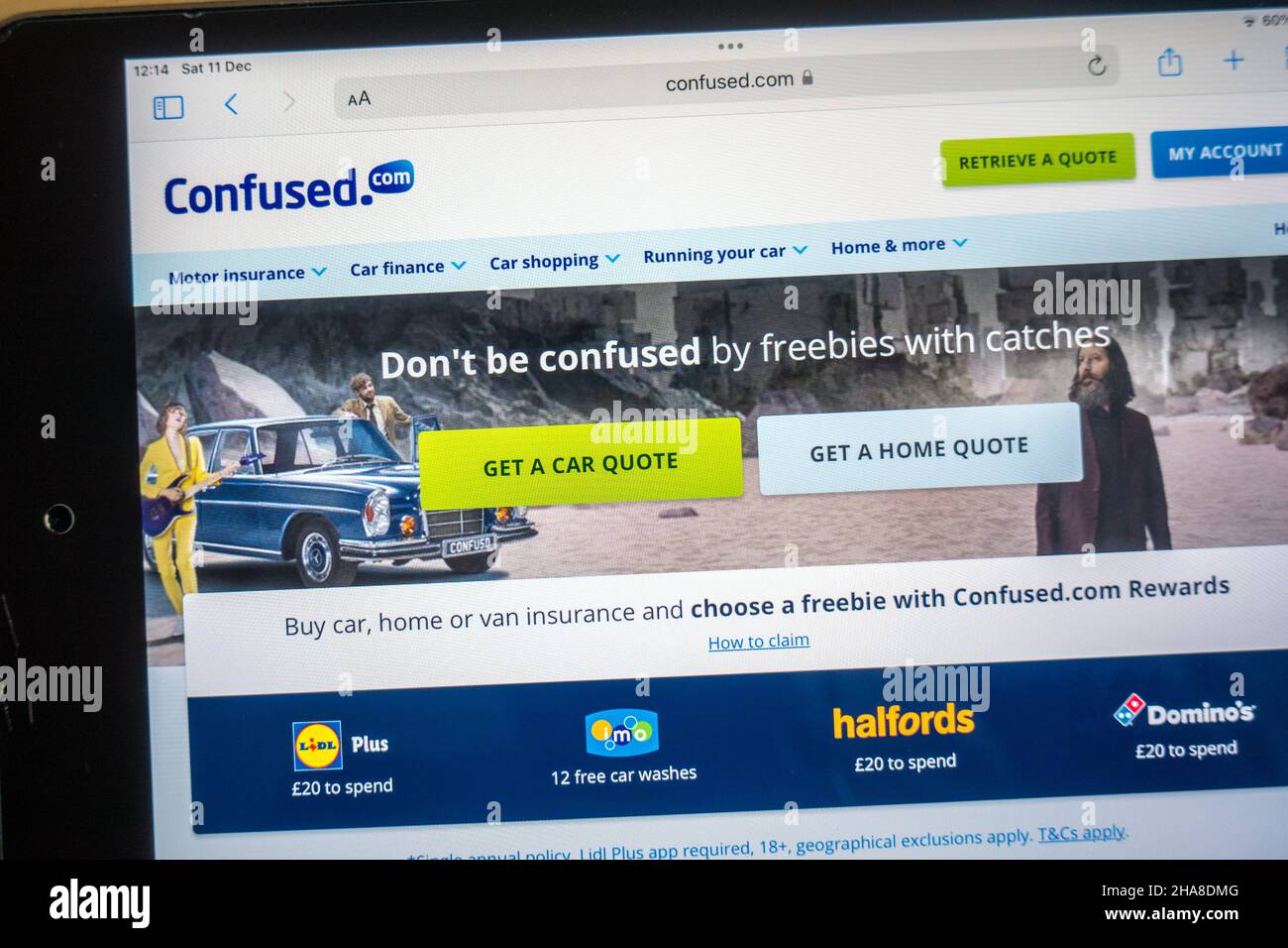 Confused.com Website des Versicherungs-Aggregators auf einem tragbaren Gerät Stockfoto