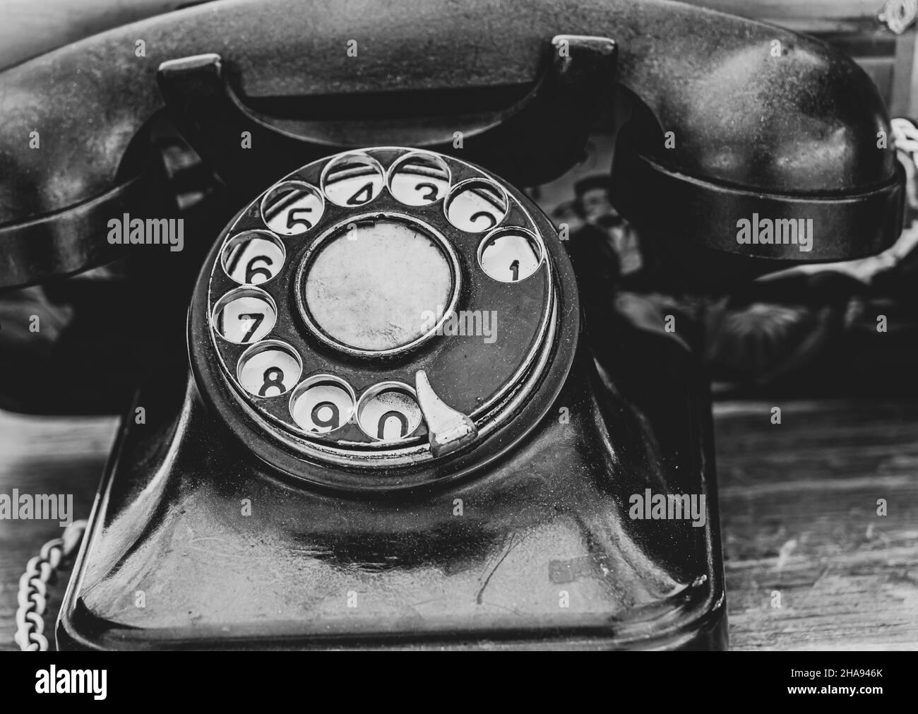 Alte schwarze retro Telefon-Disk-Händler Stockfoto