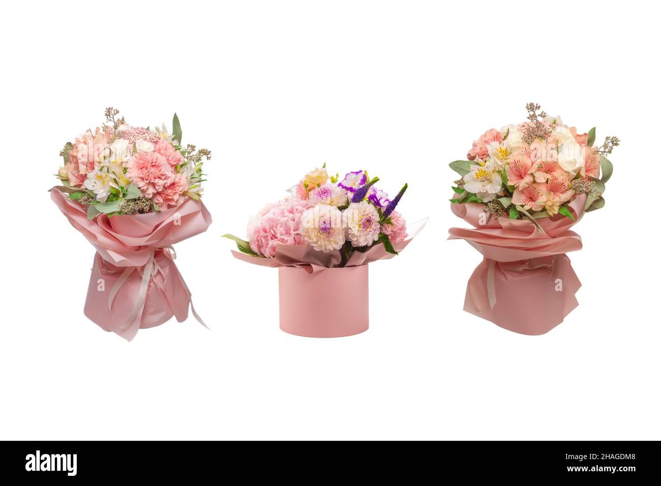 Bouquet von weichen rosa Blüten in rosa Geschenkpapier. Stockfoto