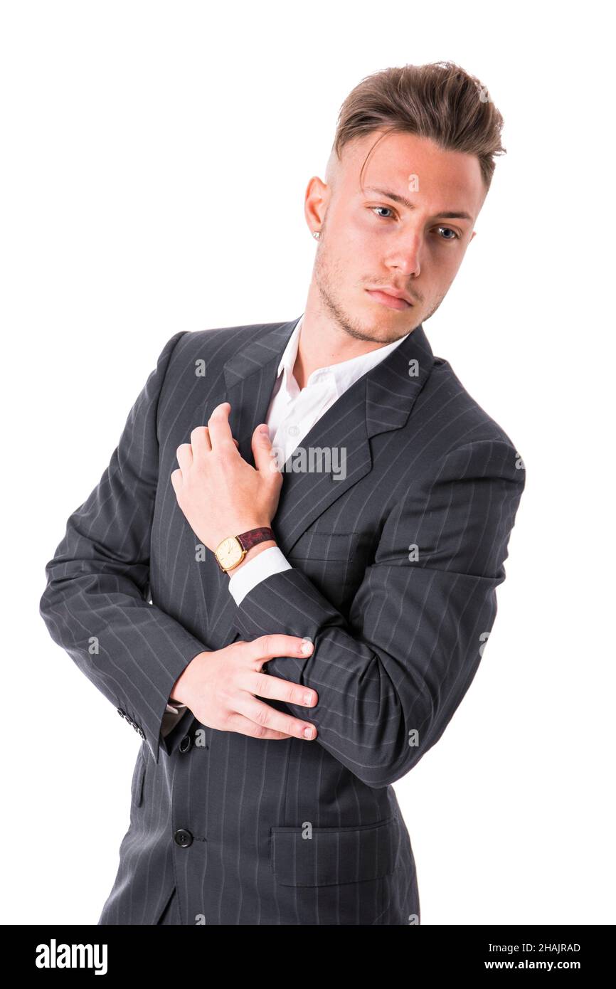 Elegante junge Mann mit Anzug im Studio Stockfoto