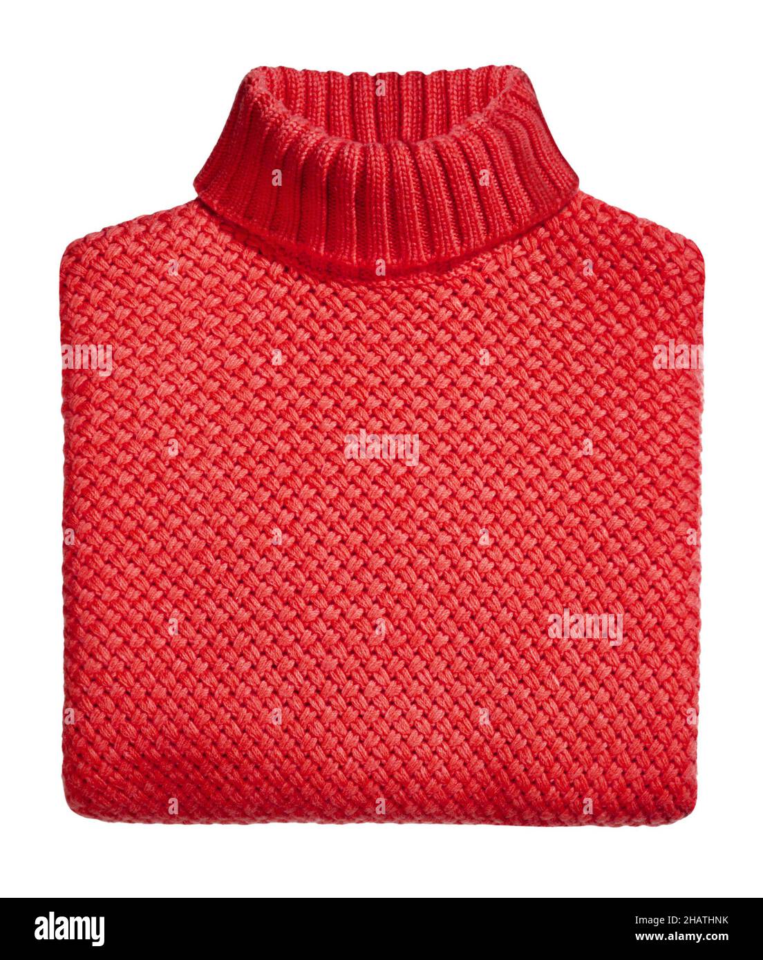 Von oben aus gefaltetem, warm-roten Strickpullover isoliert auf weißem Hintergrund im Studio Stockfoto