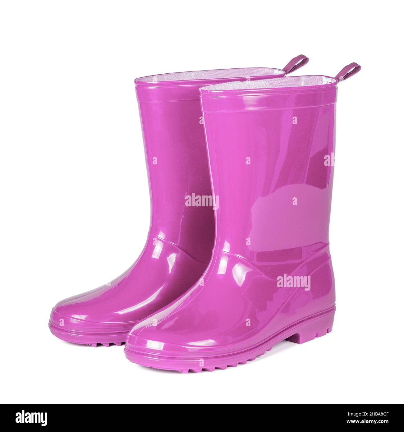 Rosa Gummistiefel isoliert auf weißem Hintergrund. Stockfoto