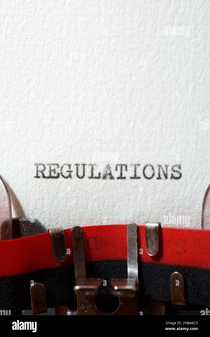 Das Wort Vorschriften mit einer Schreibmaschine geschrieben. Stockfoto