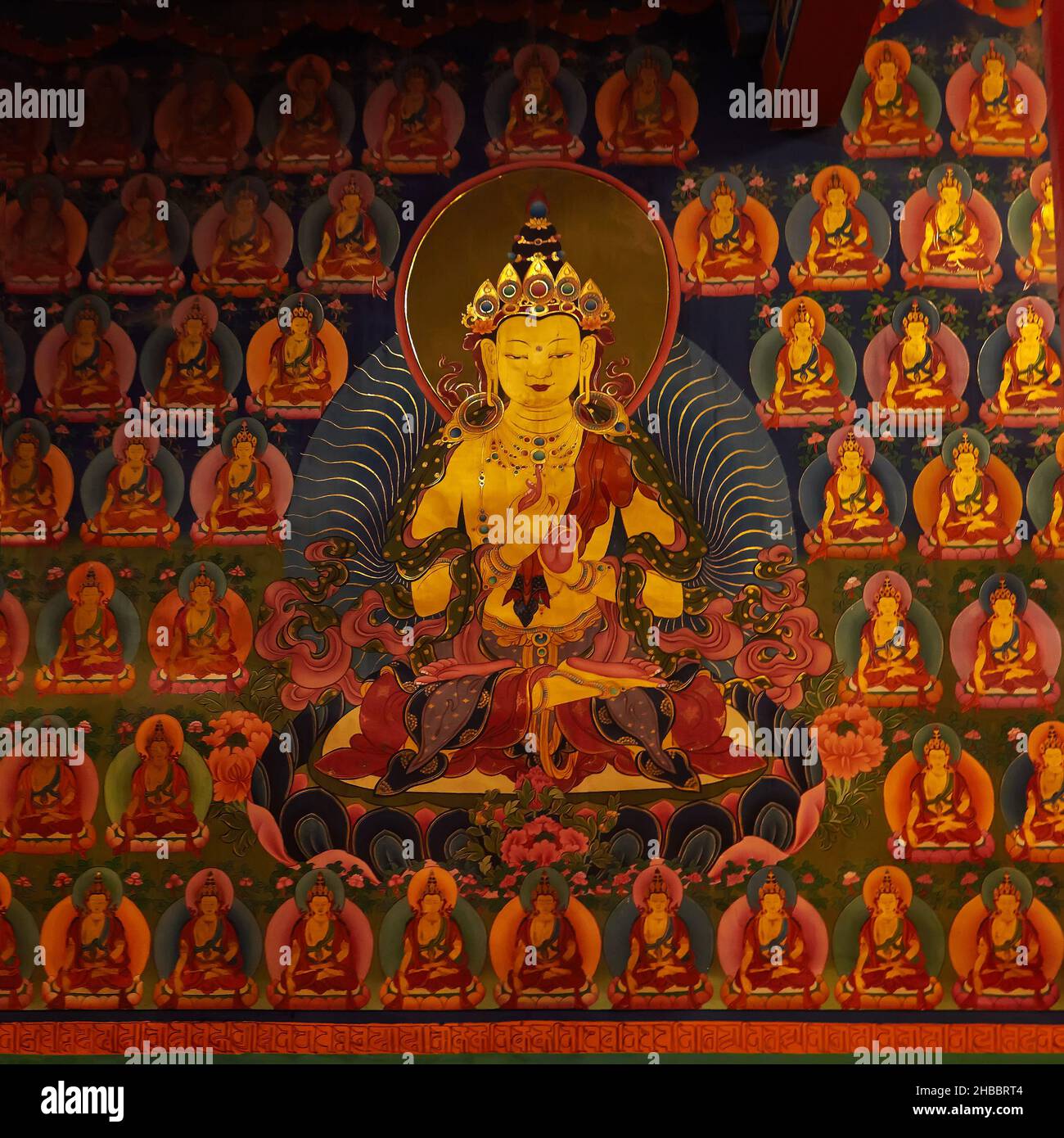 Wandmalereien zum tantrischen Buddhismus (tantrische Vajrayana-Lehren) im Hemis-Kloster. Tausend buddhas - Fragment Stockfoto