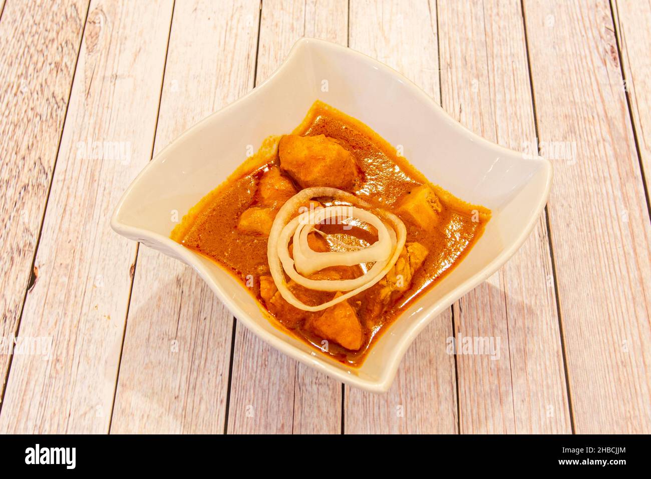 Chicken-Cuisine ist ein gängiges Rezept in den Küchen Südasiens, Ostasiens, des Vereinigten Königreichs und der Karibik. Stockfoto