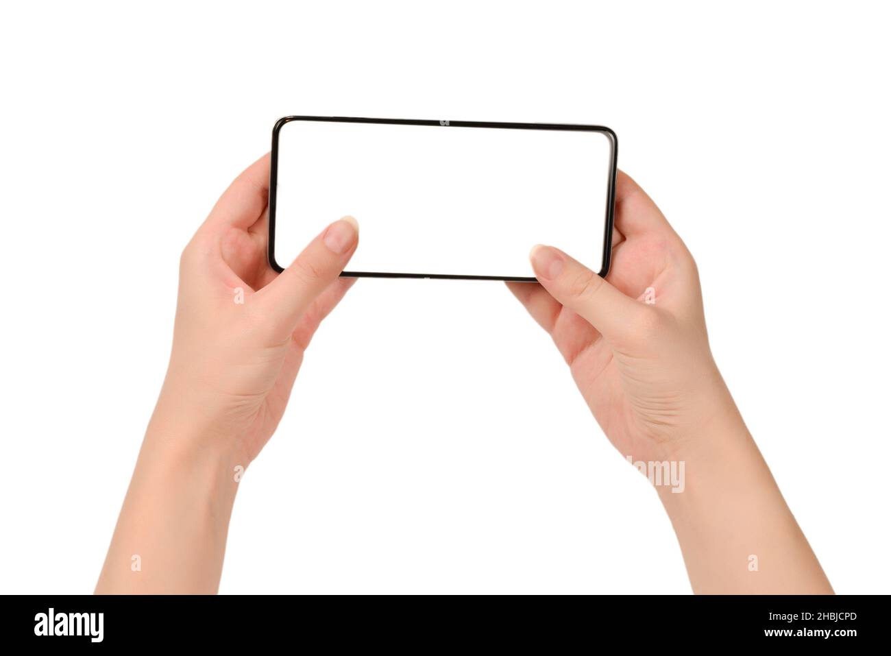 Smartphone in weiblichen Händen isoliert auf weißem Hintergrund. Weißer Bildschirm. Speicherplatz kopieren. Stockfoto