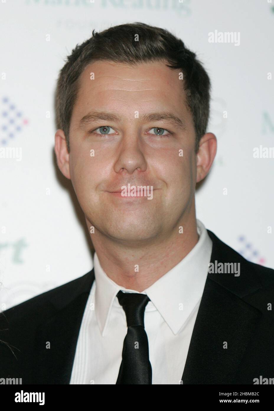 Phil Taylor von der Lehrkraft nimmt an den Ronan Keating's Emeralds und Ivy Ball in Aid of Cancer Research UK und der Marie Keating Foundation im Battersea Power Station in London Teil. Stockfoto