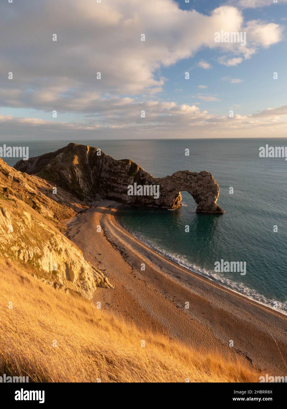 Durdle Door Jurassic Coastline Dorset England als die Sonne an einem Wintertag untergeht Stockfoto