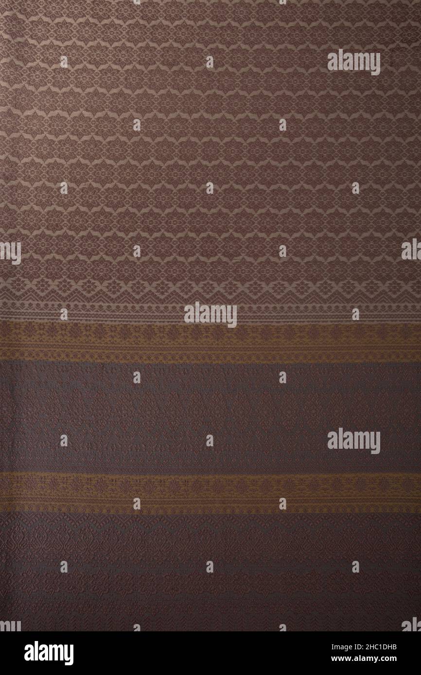 Nahaufnahme der Textur aus thailändischer Baumwolle mit nahtlosem Muster. Draufsicht für den Hintergrund. Stockfoto