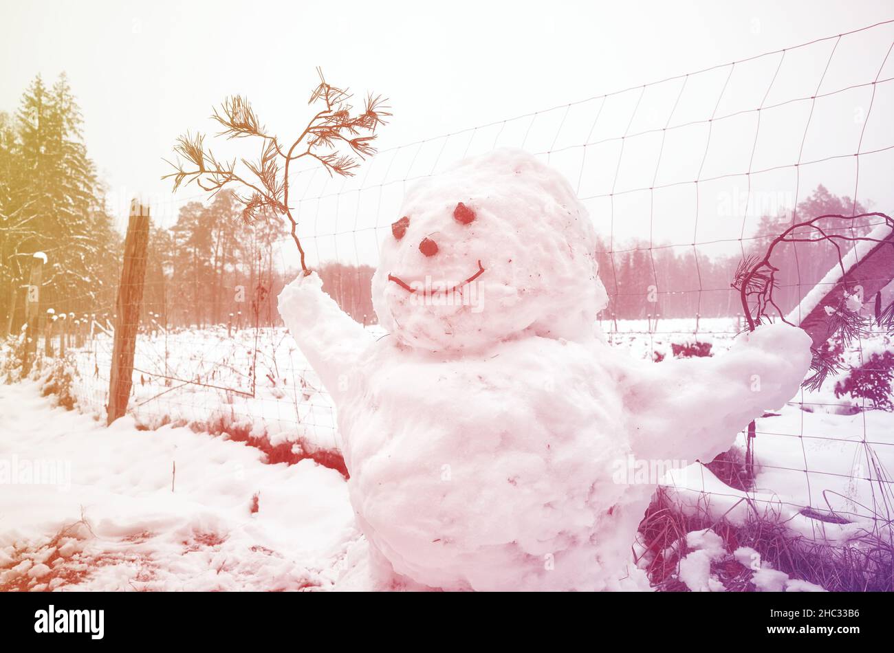 Retro getöntes Bild eines Schneemanns. Stockfoto