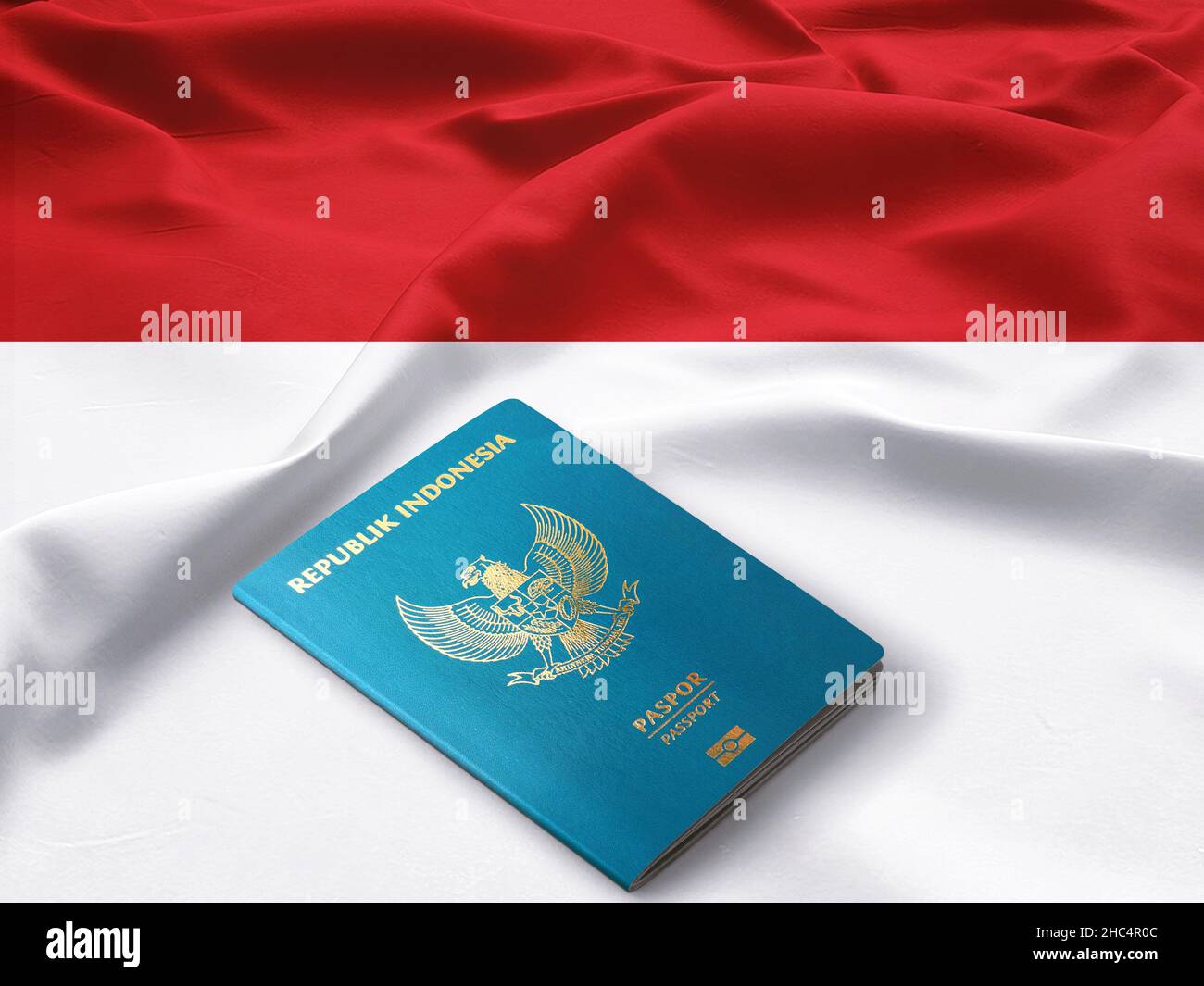 Indonesischer Pass auf einer Flagge indonesiens Stockfoto