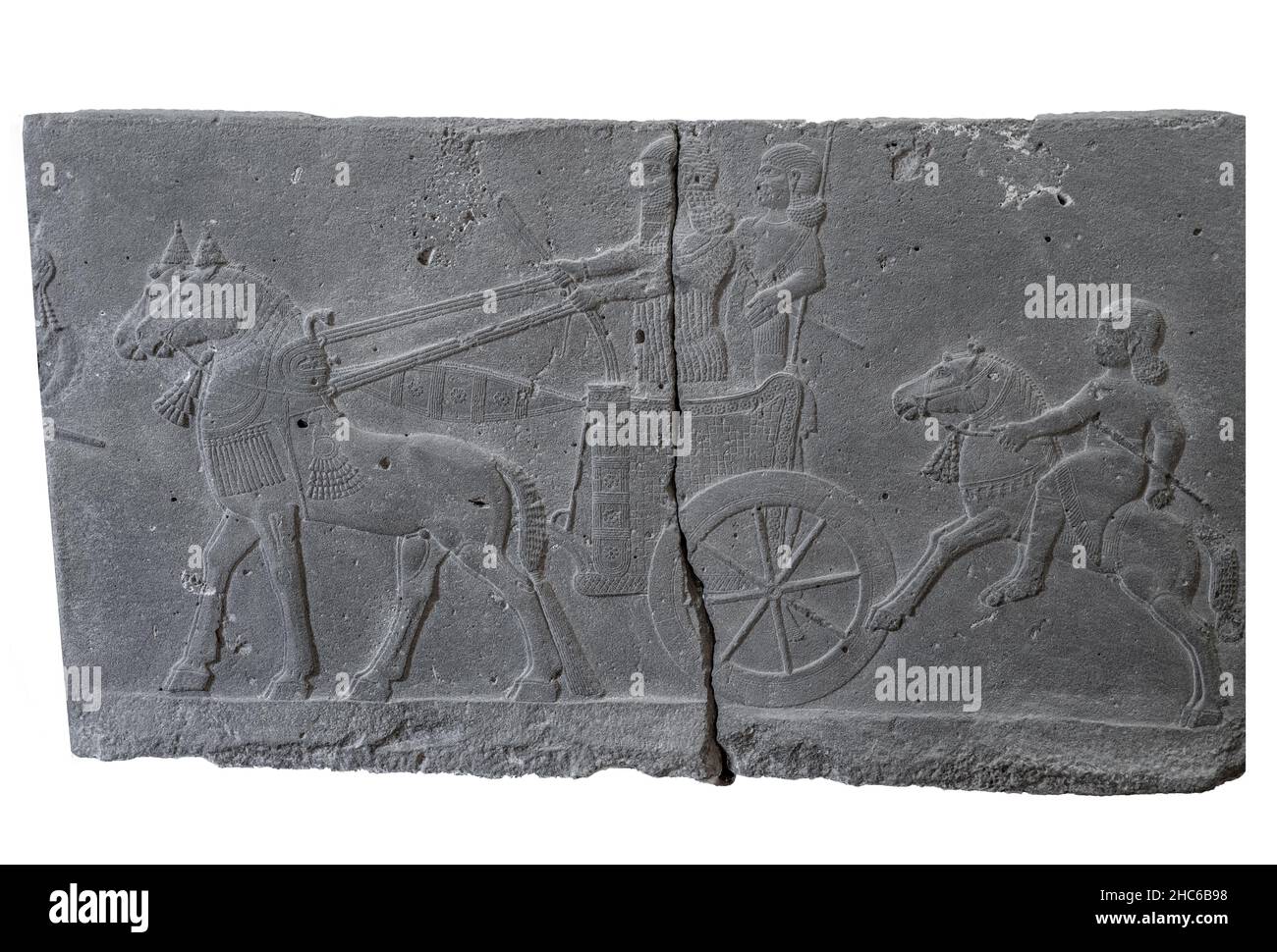 Orthostat von Streitwagen und Fahrern aus der assyrischen Zeit. Stockfoto