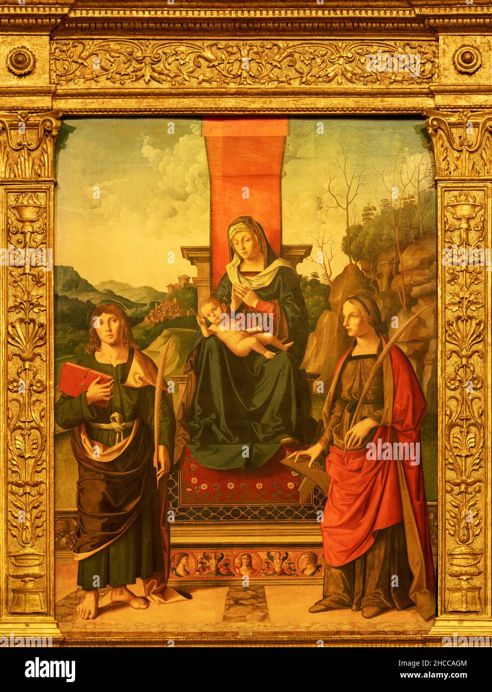 Forlí - das Gemälde der Madonna mit dem Evangelisten Johannes und der Kathedrale von Alexandria in der Kirche Basilica San Mercuriale. Stockfoto