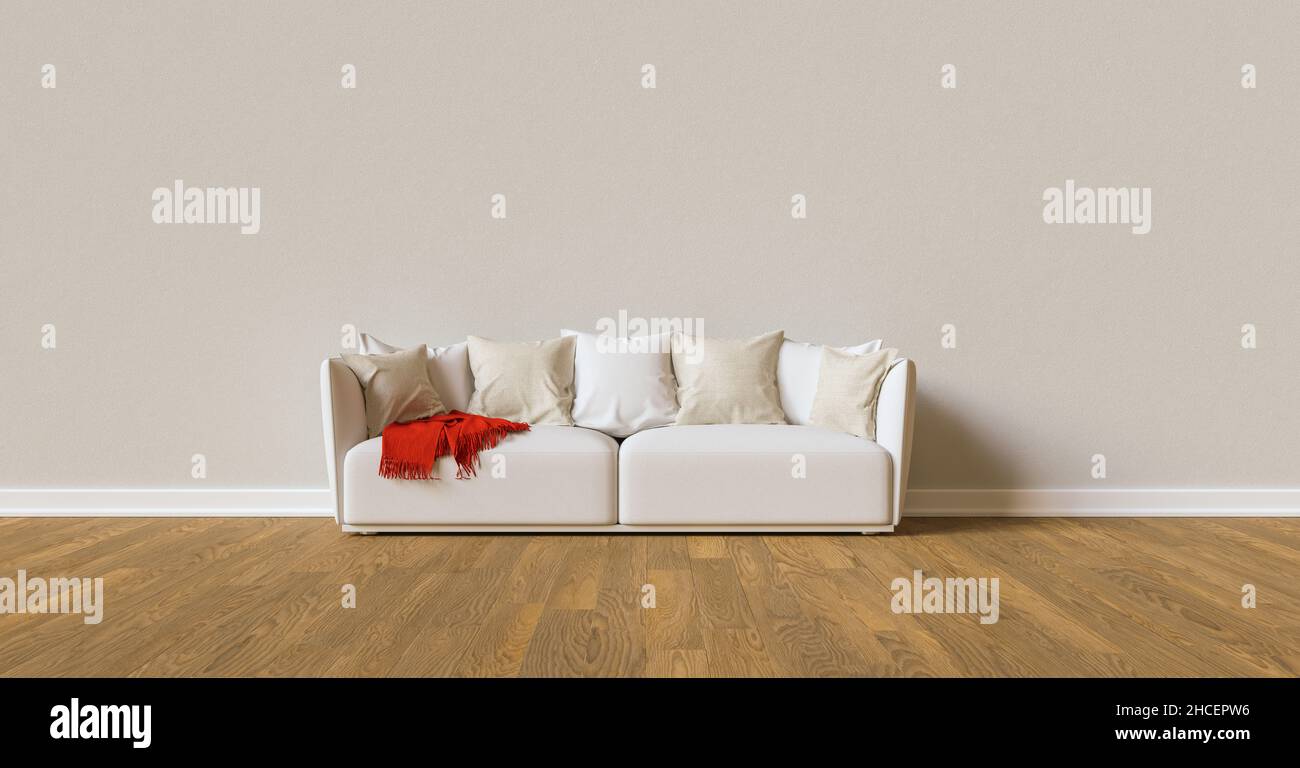 Sofa an einer grauen Wand im Wohnzimmer mit Platz für Canva Stockfoto