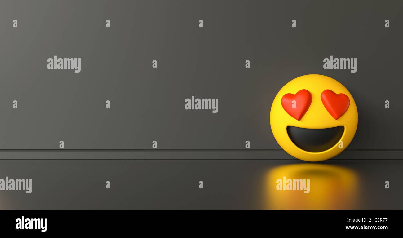 Lächeln Sie in Liebe Emoji ob dunkelgrauer Hintergrund, Social Media und Kommunikation Konzept Bild, Bannergröße, Copyspace für Ihren individuellen Text. Stockfoto