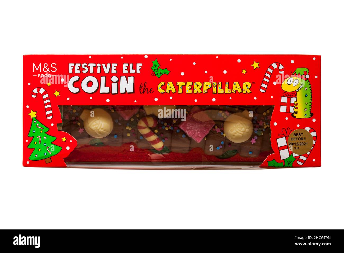 Festlicher Elf Colin die Caterpillar-Torte von M&S isoliert auf weißem Hintergrund Stockfoto