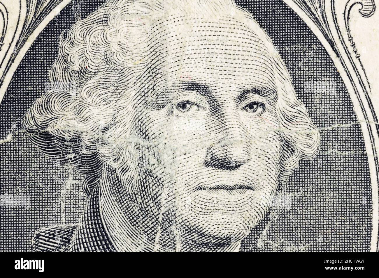 Makroansicht von George Washington auf abgenutzter schmutziger US-Dollar-Rechnung. Stockfoto