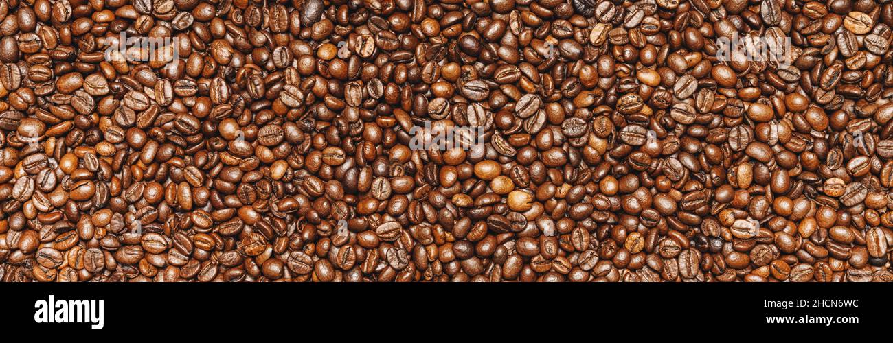 Geröstete Kaffeebohnen Hintergrund Textur oder Hintergrund, Bannergröße Stockfoto