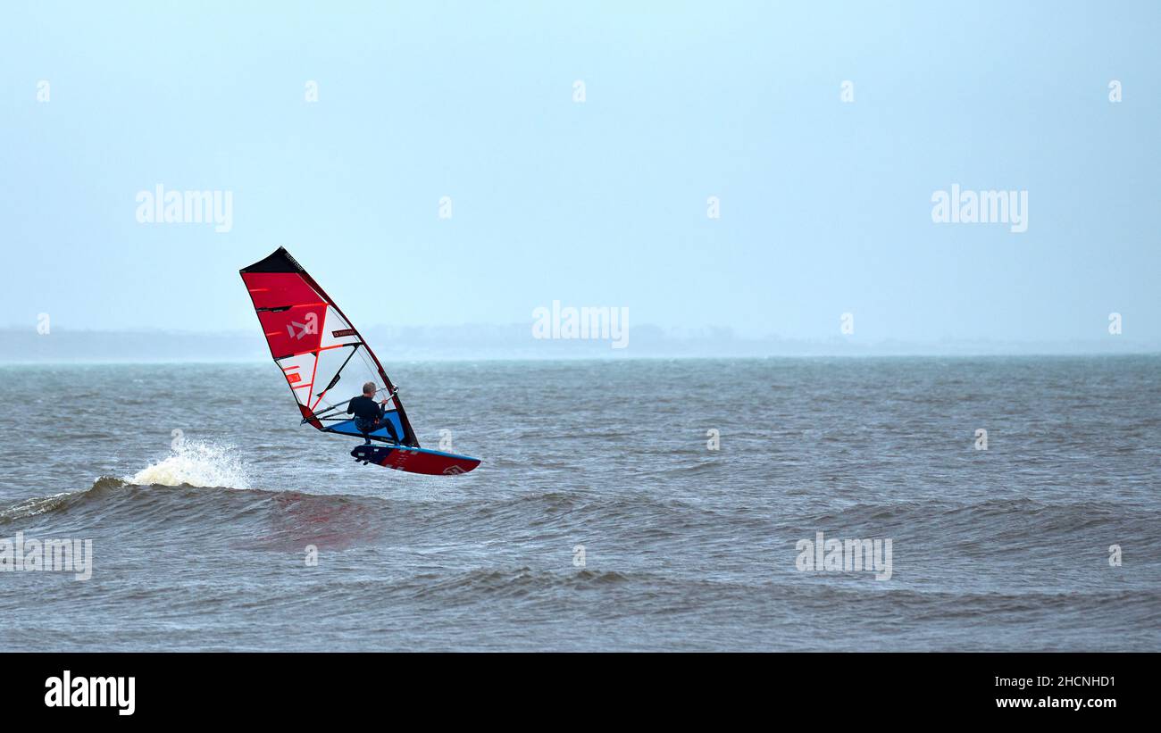 Windsurfing-Action in Mudeford Stockfoto