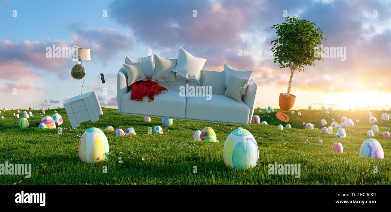 Zero Gravity Sofa schwebt über vielen bunt bemalten Ostereiern auf einer Wiese mit Möbeln bei Sonnenuntergang Stockfoto