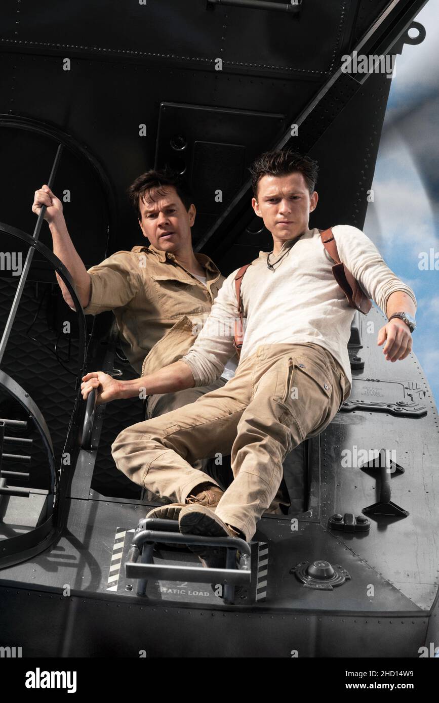 MARK WAHLBERG und TOM HOLLAND in UNCHARTED (2022), Regie: RUBEN FLEISCHER. Kredit: COLUMBIA BILDER / Album Stockfoto