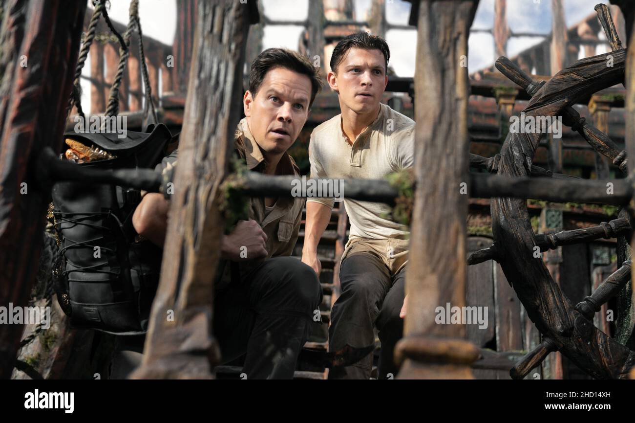 MARK WAHLBERG und TOM HOLLAND in UNCHARTED (2022), Regie: RUBEN FLEISCHER. Kredit: COLUMBIA BILDER / Album Stockfoto