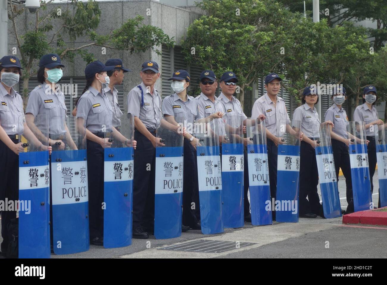 DIE ROC-NPA Spezialpolizei rührte Schilde vor dem Wang-Zhang Treffen 20140625 auf. Stockfoto