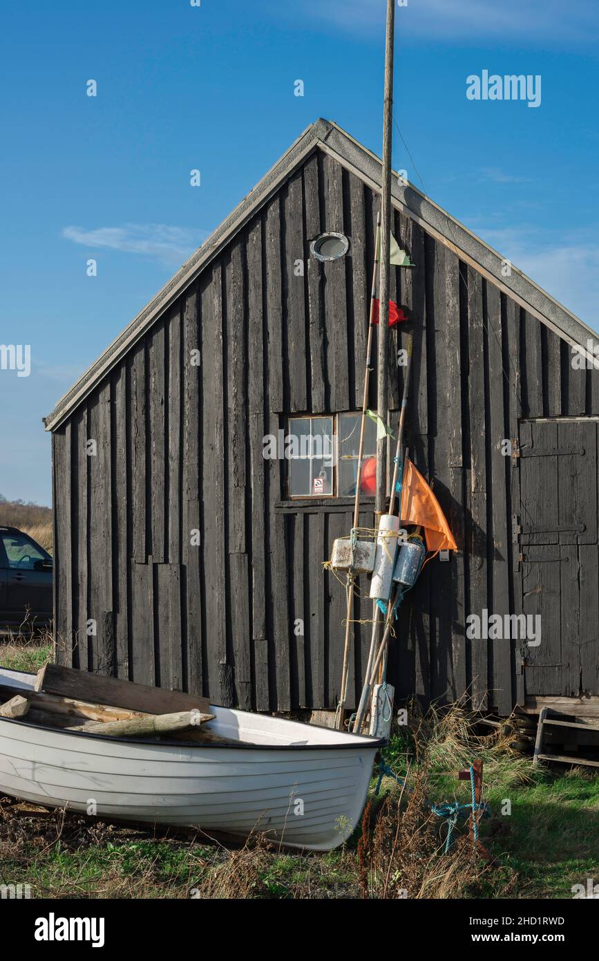 Fischerhütte Suffolk, Blick auf eine ehemalige Fischerhütte am Walberswick Quay, Suffolk, England, Großbritannien Stockfoto