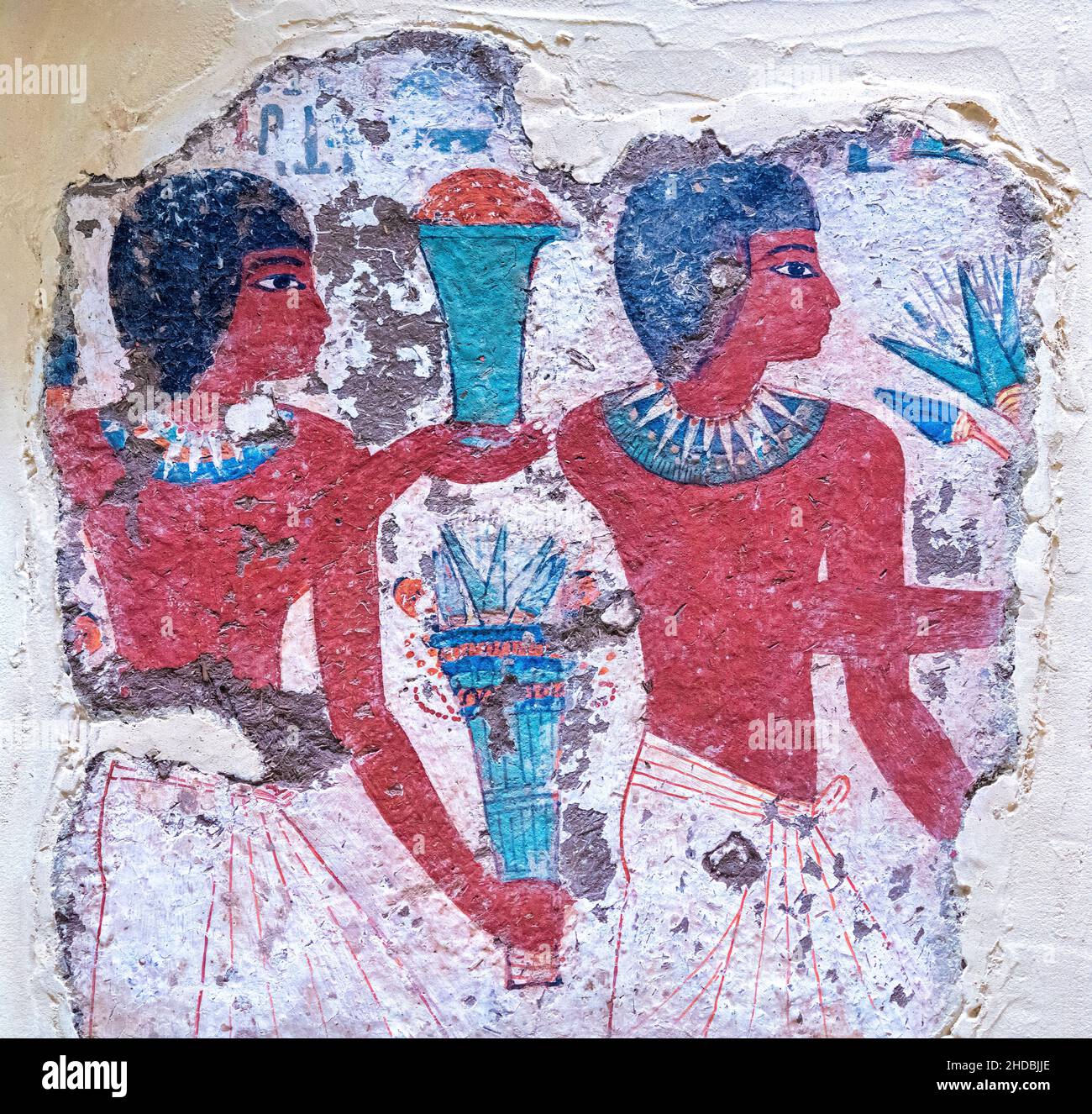 Ägyptische Gemälde von Männern, die Opfer zu einer Beerdigung bringen. Antike Objekte der ägyptischen Kultur im Royal Ontario Museum (ROM) am 5. Januar 2022 Stockfoto