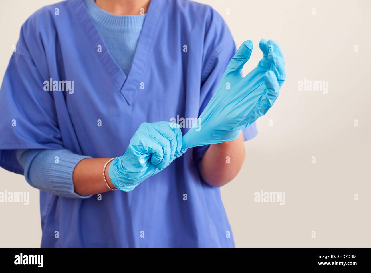 Arbeitsschutzkleidung, Handschuhe, steril, Peelings, Arbeitsschutzkleidung, Handschuh, Sterile, Peeling Stockfoto