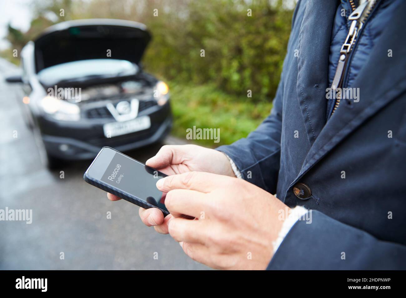 Fahrzeugpanne, Notfall, Smartphone, Fahrzeugpanne, Notfälle, Smartphones, Smartphones, Smartphones Stockfoto