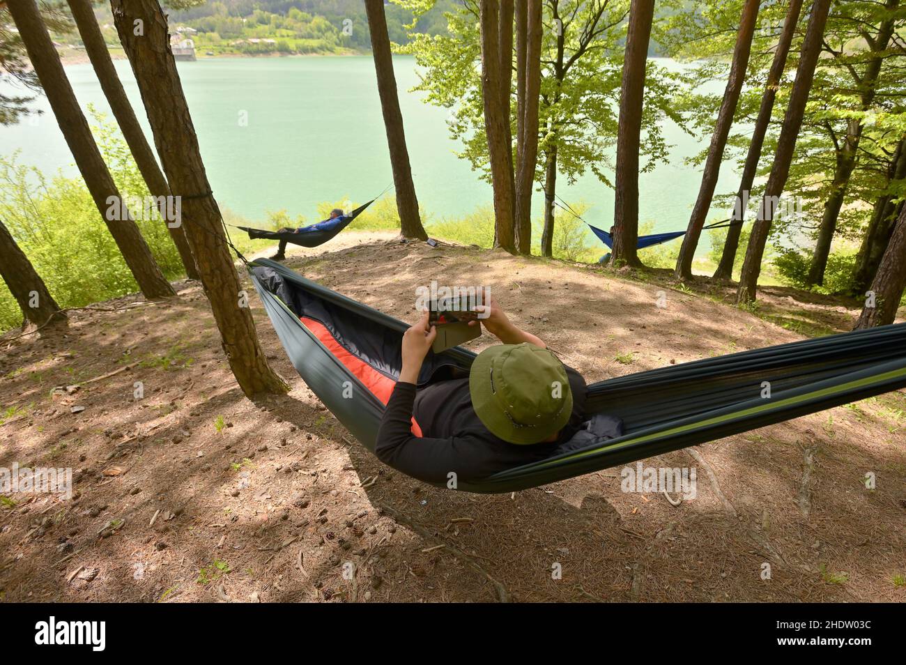 Fotografie, Smartphone, Hängematte, Fotografien, Smartphones, Smartphone, Smartphones, Hängematten Stockfoto