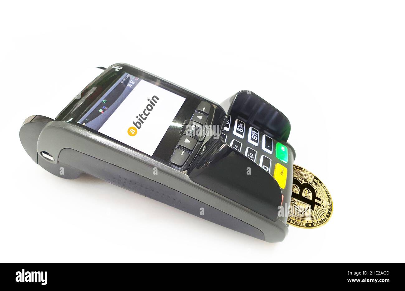 Bezahlen Sie mit Bitcoin, Bezahlautomat POS-Terminal Stockfoto