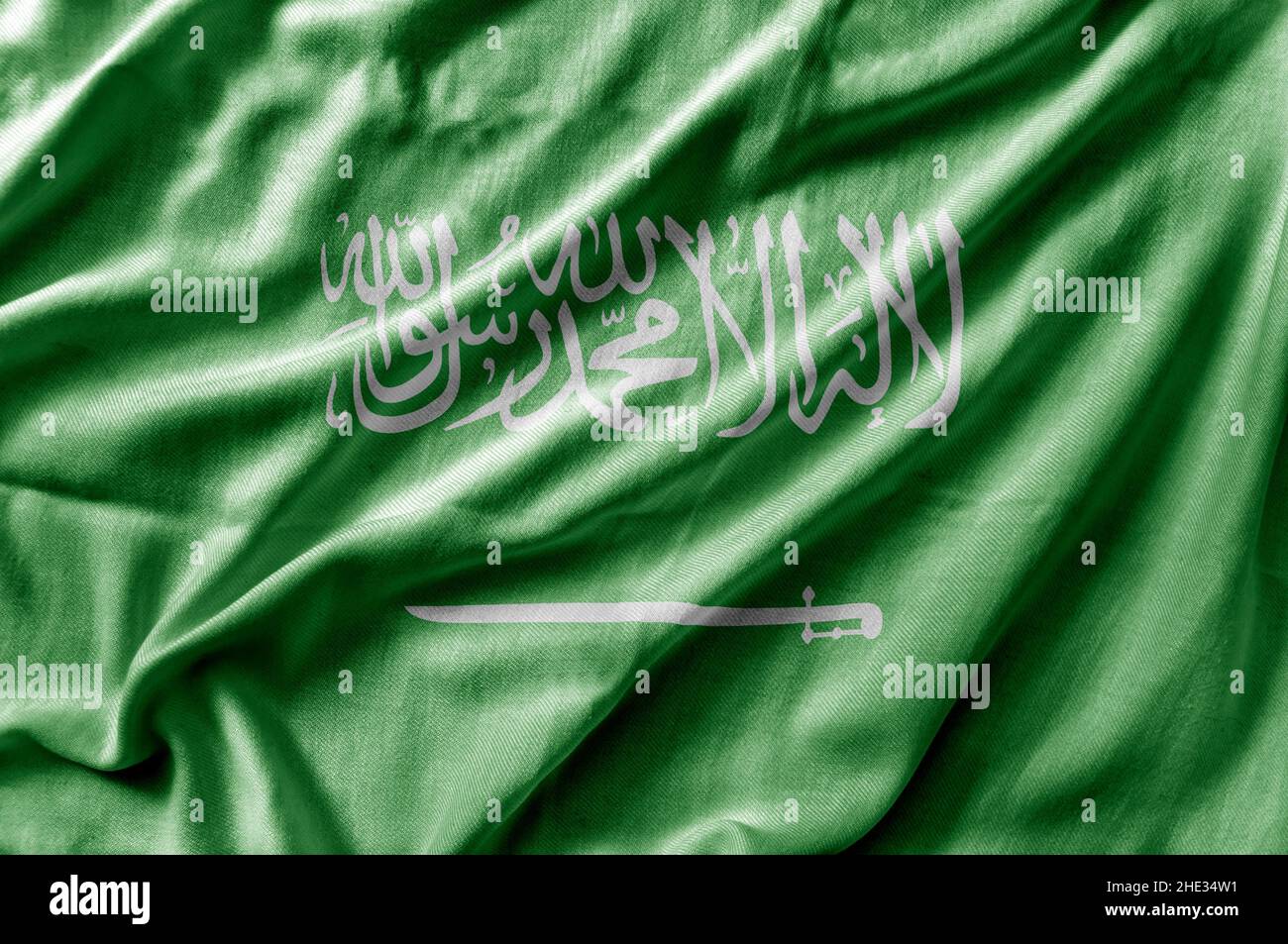 Winkende detaillierte Nationalflagge Saudi-Arabiens Stockfoto