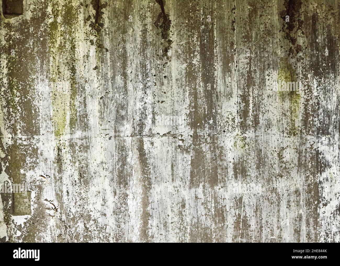 Abstrakte Textur an der alten Wand eines verlassenen Hauses. Ausgezeichneter abstrakter Hintergrund Stockfoto