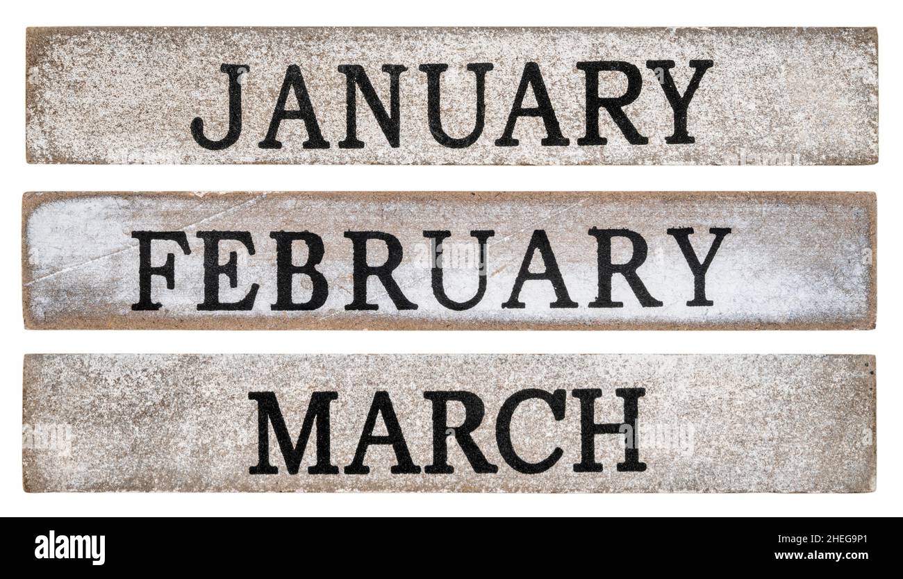 Januar, Februar und März Monate - grober Text auf grunge Holzblöcke isoliert auf weiß Stockfoto