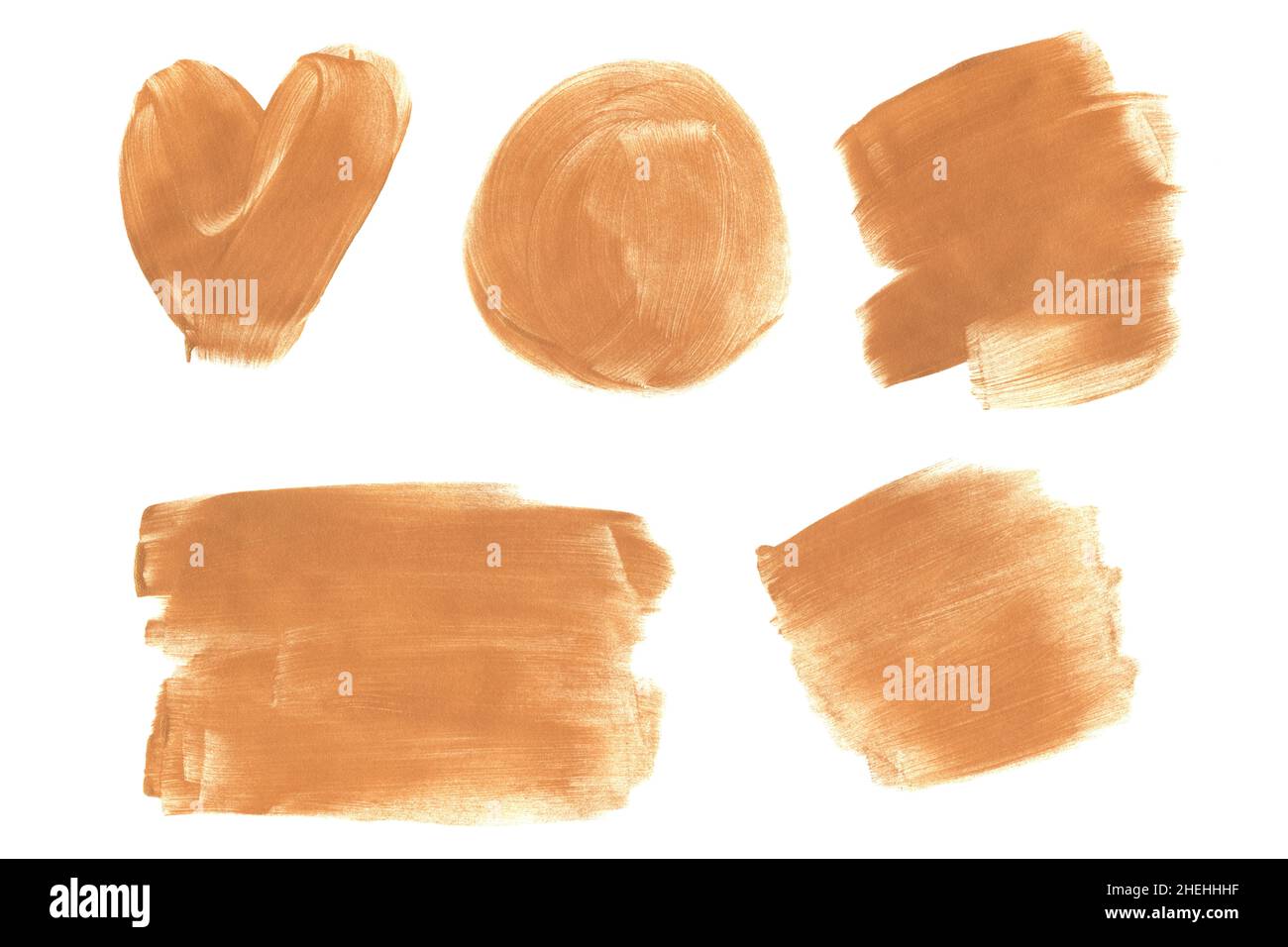 Set aus golden glitzernden Acryl-Pinselstrichen isoliert auf weißem Hintergrund. Dekorative Designelemente. Stockfoto