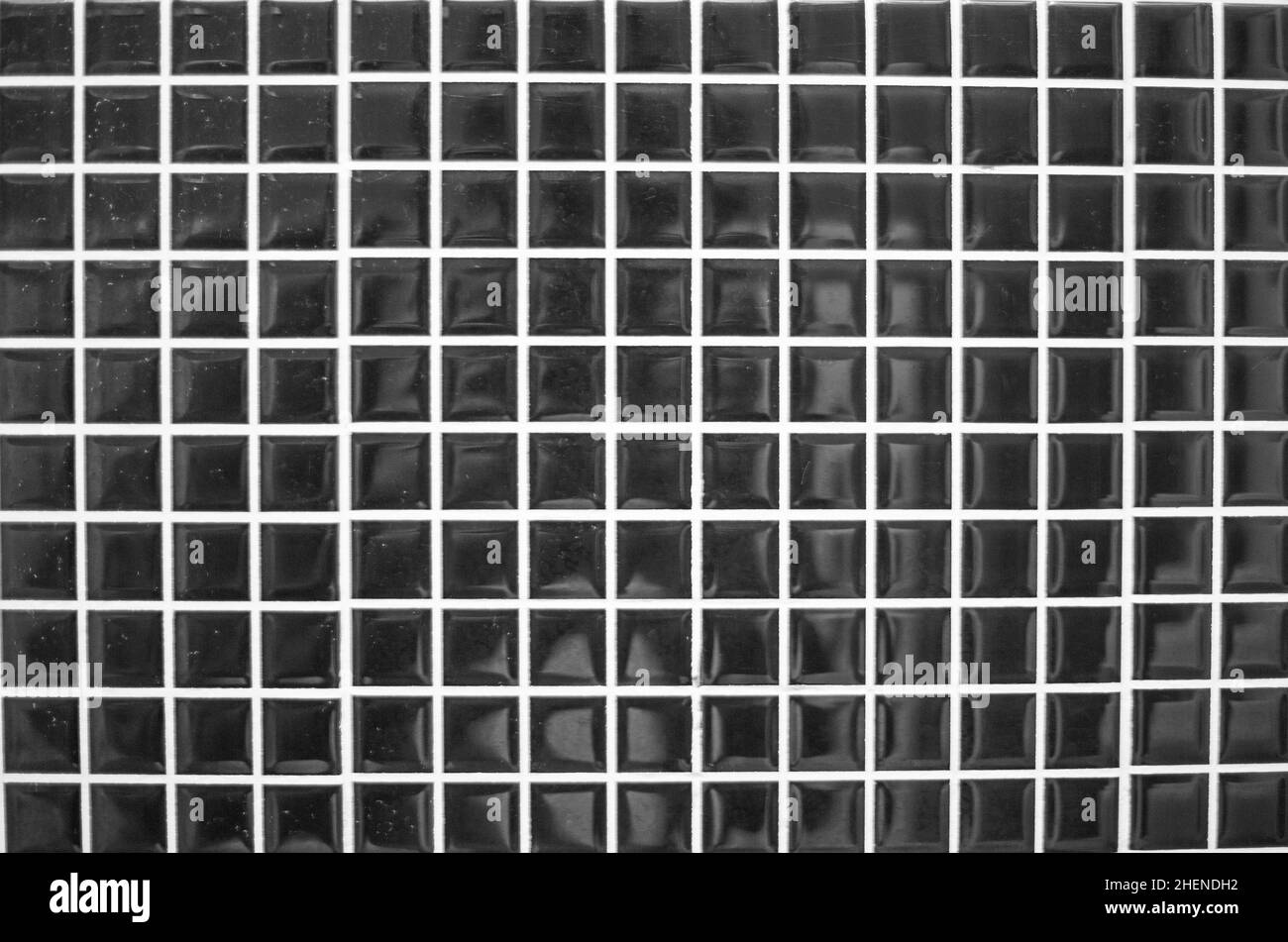 Texturmuster von sich wiederholenden Mustern an der Wand Stockfoto