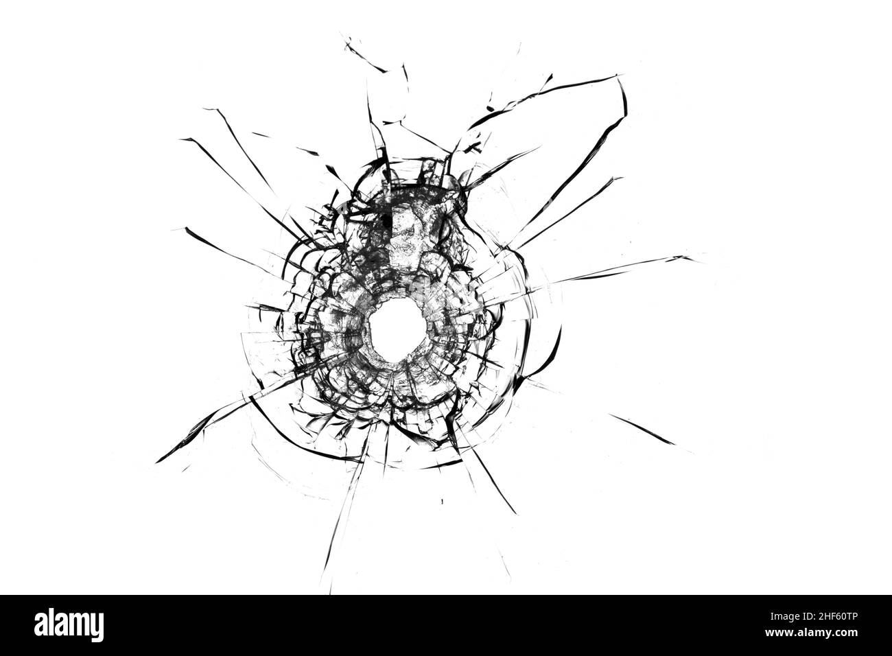 Die Textur von zerbrochenem Glas. Einschussloch Stockfoto