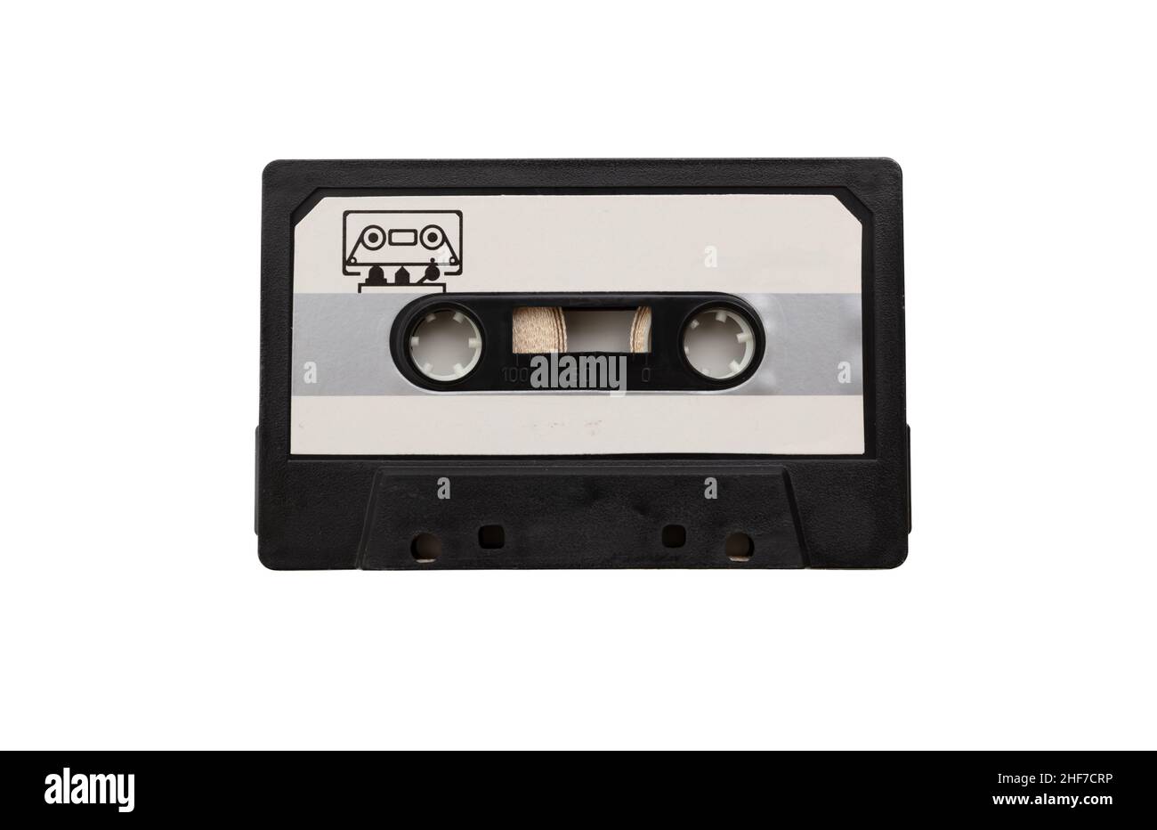 Kassettenaudio mit leerem Etikett auf weißem Hintergrund isoliert. Reinigungsband, schwarzes, weißes Etikett. Retro-Musik und -Sound Stockfoto