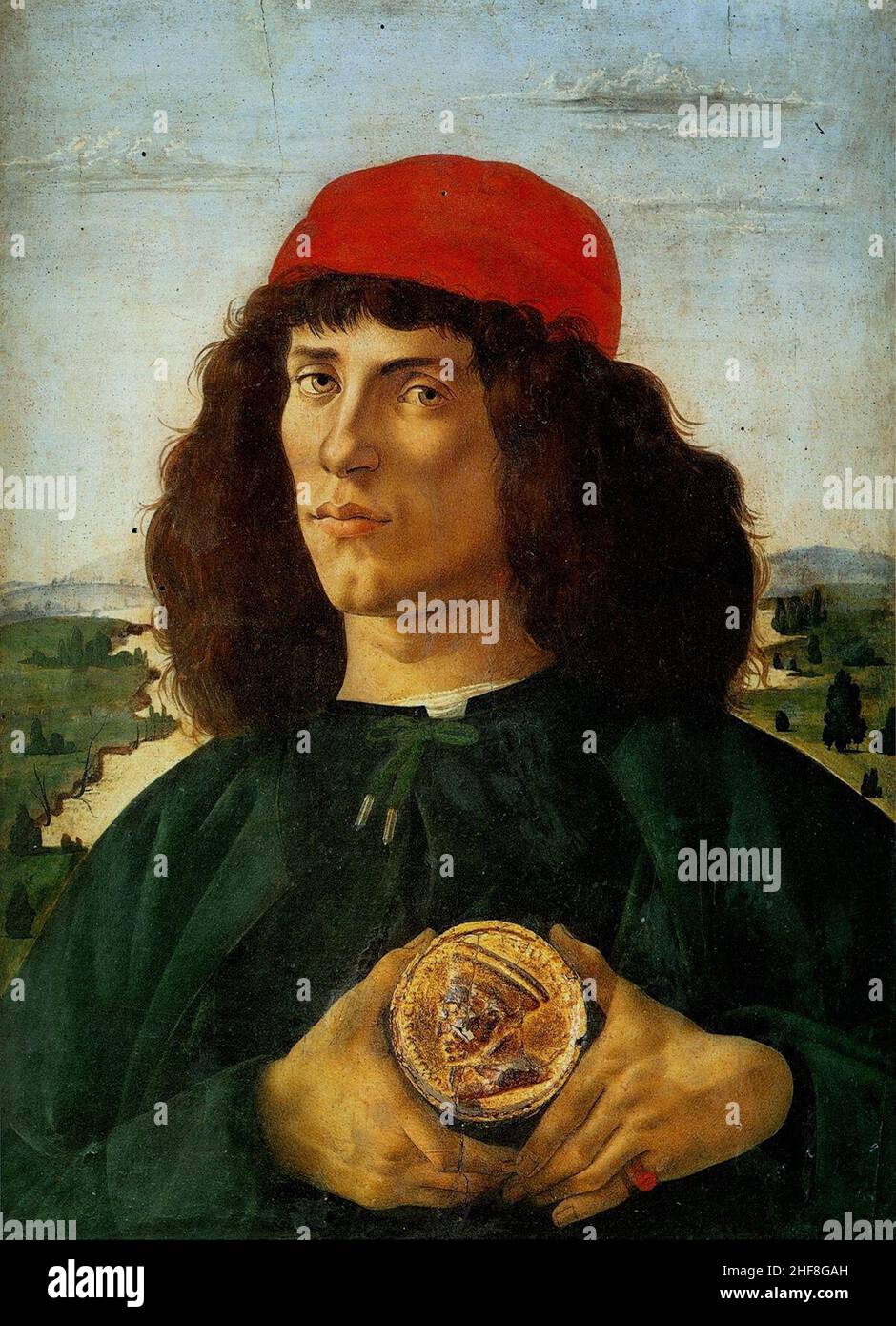 Sandro Botticelli - Porträt eines Mannes mit einer Medaille von Cosimo dem Älteren. Stockfoto