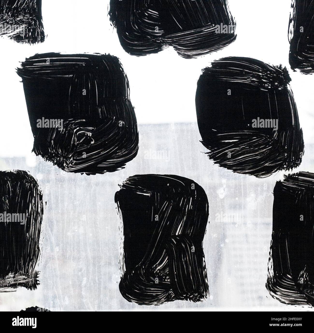Muster der lackierten schwarzen und weißen Glasfassade Stockfoto