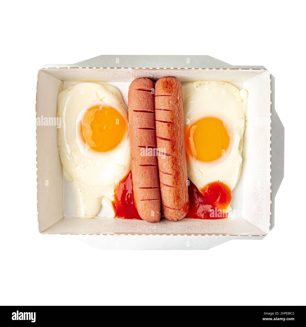 Isoliertes Frühstück zum Mitnehmen mit Ei und Würstchen Stockfoto
