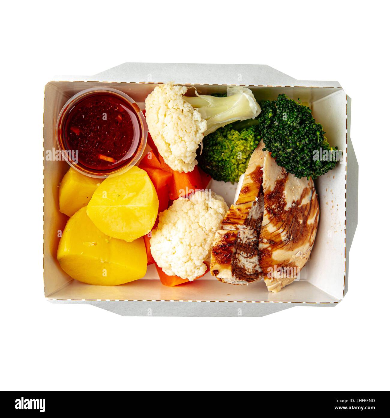 Isoliertes gesundes Mittagessen mit Huhn und Gemüse Stockfoto