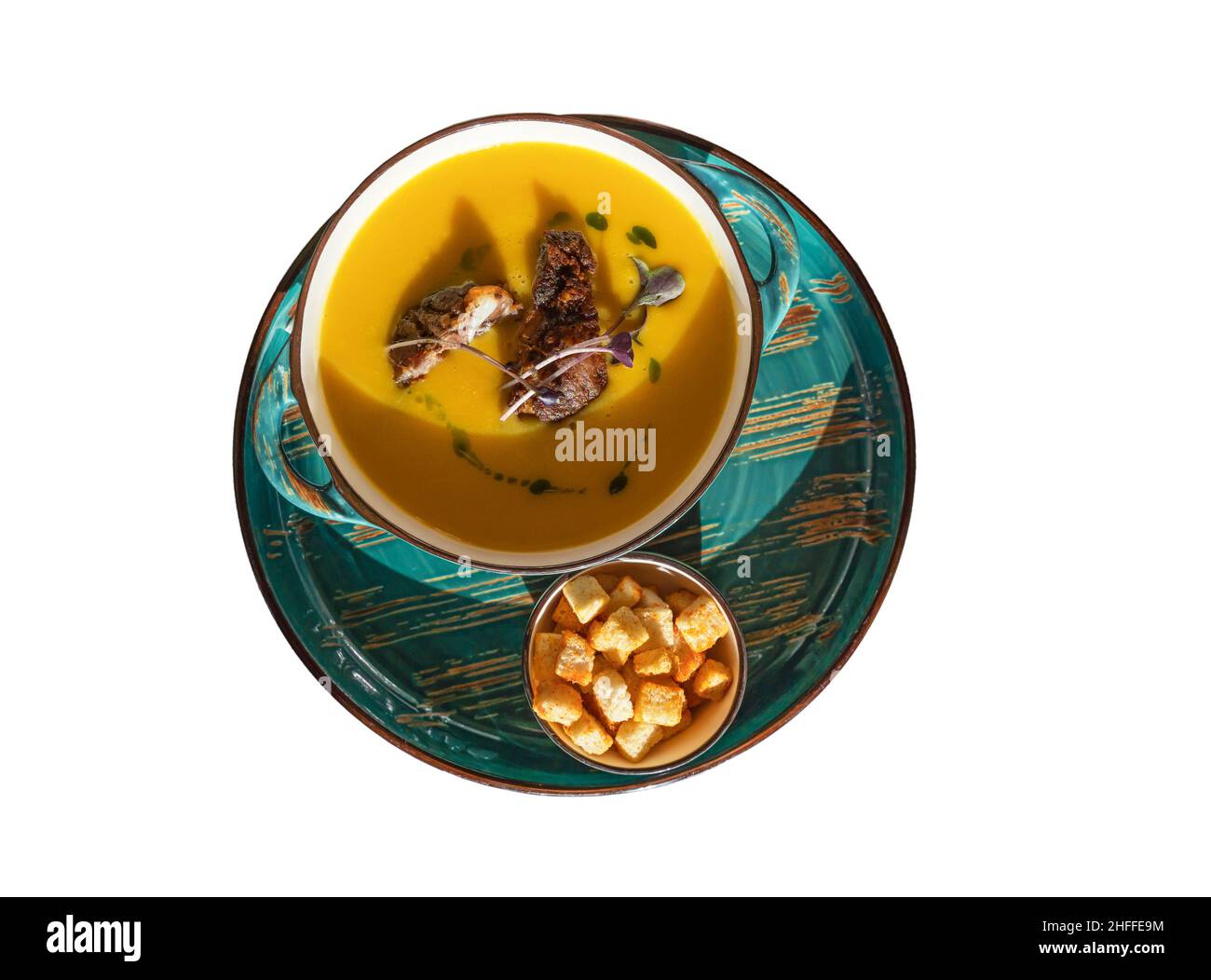 Cremige Butternut-Squash-Suppe mit Croutons. Stockfoto