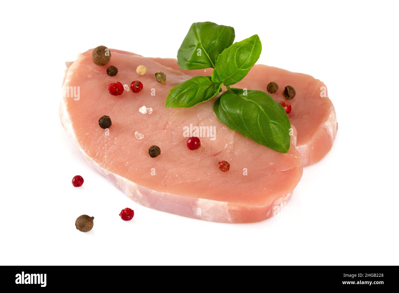 Rohes Schweinefleisch Stücke isoliert auf weißem Hintergrund Stockfoto
