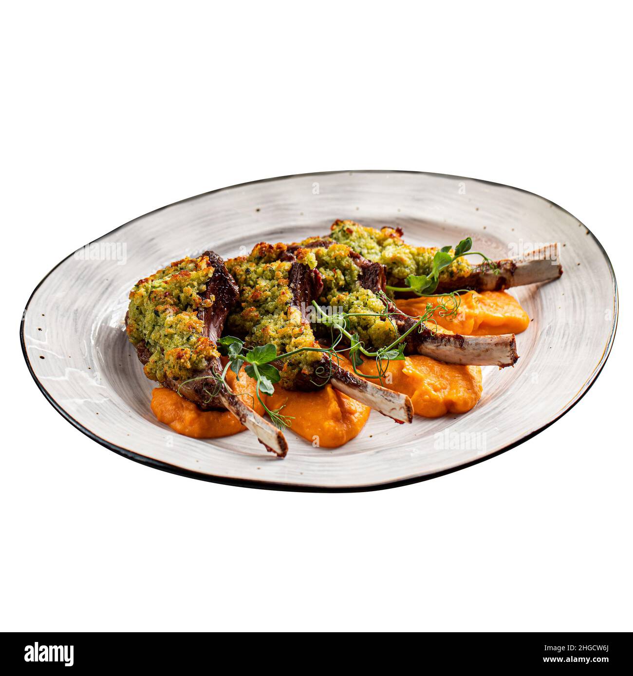Isoliertes Lammfleisch mit Süßkartoffel und Sauce Stockfoto